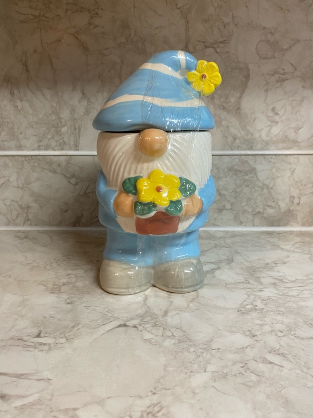 Blue & White Ceramic Gnome Cookie Jar with Yellow Flower